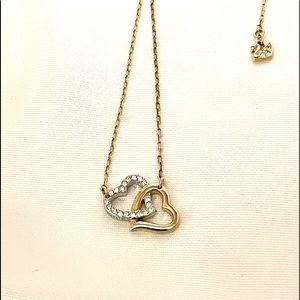 Authentic swan Swarovski double pave heart pendant gold tone.